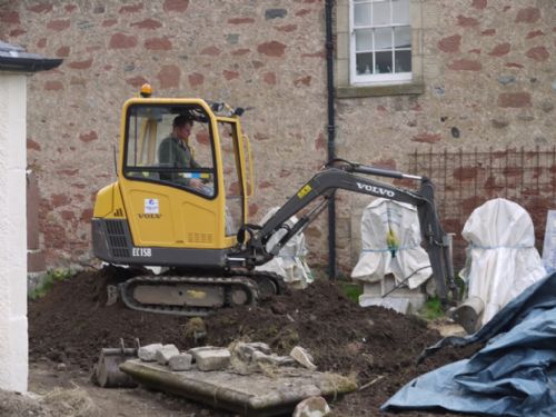 digger in the East Church, Cromarty